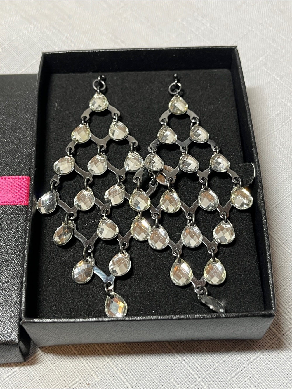 Avon Crystal Teardrop Chandelier Earrings - Black Metal
NEW